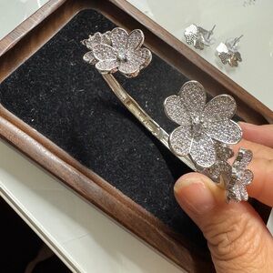 Elegant Silver Floral Bracelet and earrings set